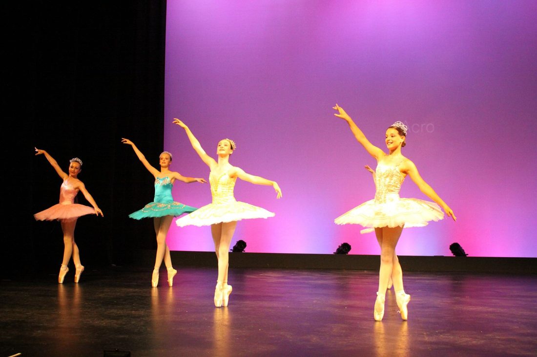 Ballet students performing on stage at Annual Concert